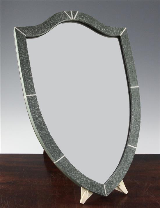 A 1920s shield shaped toilet mirror, H.19.5in.